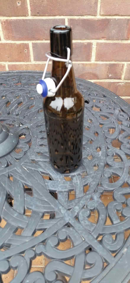 Photo of free Beer crate and 20 500ml swing top brown beer bottles (Lordship Estate SG6) #3