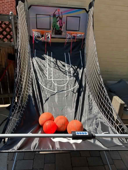 Photo of free Indoor/Outdoor basketball (On curb Kearney St (10th/11th)) #1