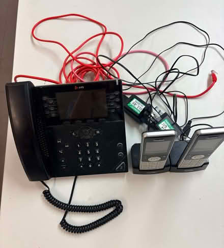 Photo of free Phone landline Base and two Yealink hand sets & bases (Devoran TR11) #1