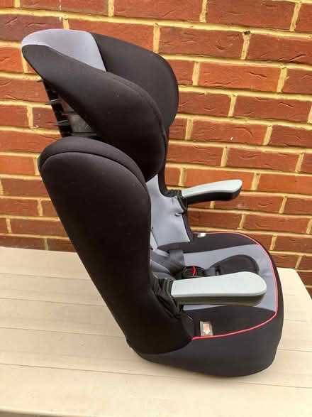 Photo of free Child’s car travel seat: Black & grey with red trim. (Theale RG7) #1