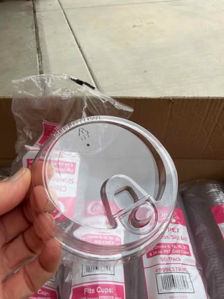 Photo of free 980 Clear Plastic Cold Cup Lids (Darien - near 75th x Cass Ave.) #2