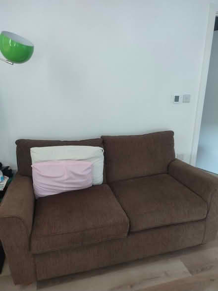 Photo of free Brown 2 seater sofa (SG19, sandy post office) #1