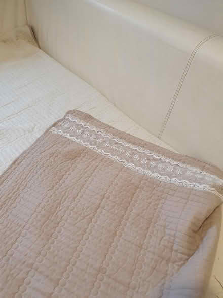 Photo of free Long white leather sofa and throw (Leeds LS12) #2