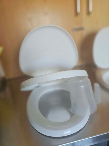 Photo of free 2 toilet seats with child seat fitted (Greenford W7) #1