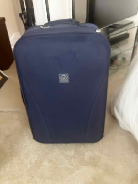 Photo of free Navy suitcase 2 wheels (Churchtown Southport PR9 7LF) #1