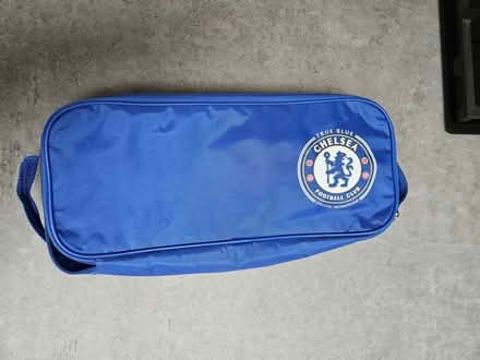 Photo of free Chelsea football boots bag and childs shin pads (Wandsworth Common SW11) #1