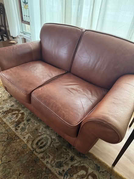Photo of free Leather loveseat in good condition (St. Paul Mac groveland) #2
