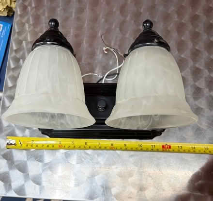 Photo of free Bathroom light fixture sconce (4422 Davenport St NW) #1