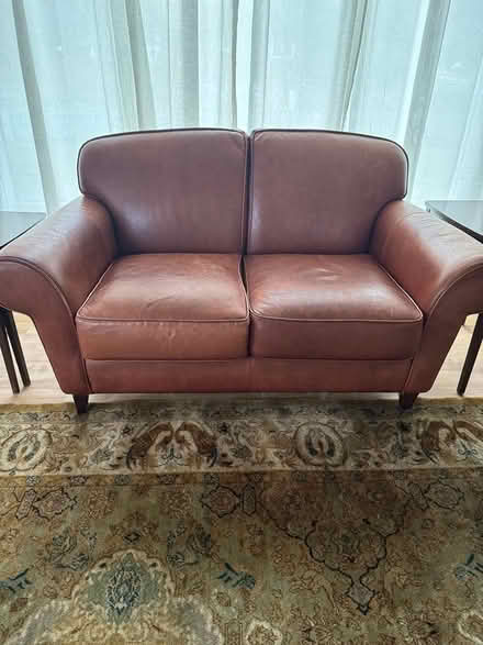 Photo of free Leather loveseat in good condition (St. Paul Mac groveland) #1