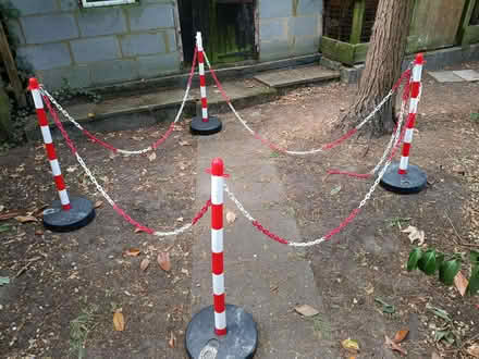 Photo of free 4 Plastic Bollards (85cm H) with approx 10m of plastic chain (Old Woking GU22) #1