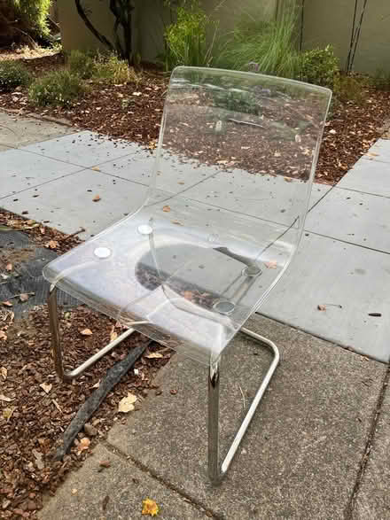 Photo of free IKEA Tobias acrylic chair w crack (715 C St, San Rafael) #1