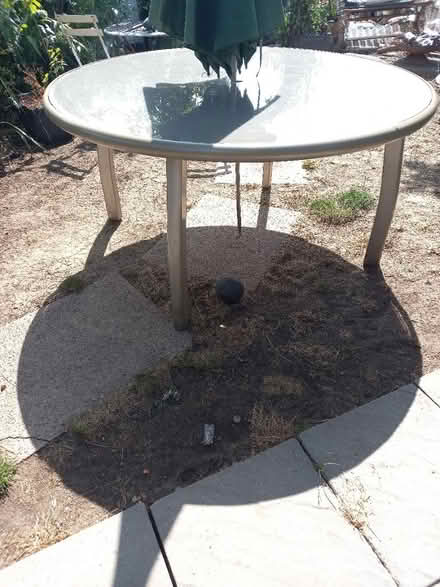 Photo of free Large glass and steel garden table (Anstey LE7) #1