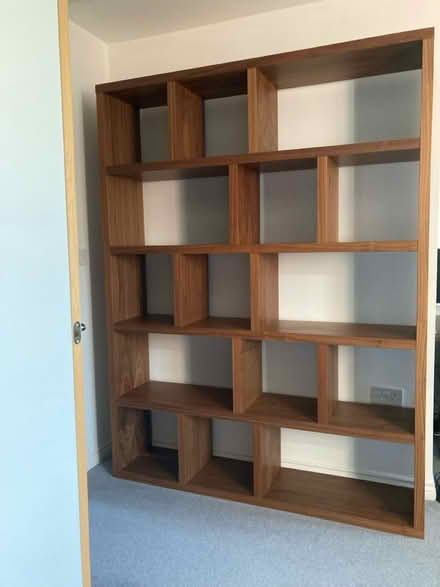 Photo of free Tall wood effect shelving unit (Aston Clinton) #1
