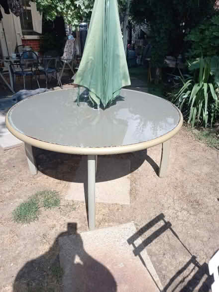 Photo of free Large glass and steel garden table (Anstey LE7) #2