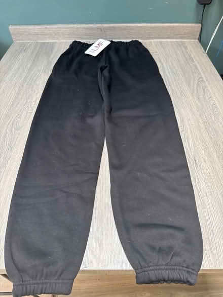 Photo of free Black Jogging Bottoms. Small. Label attached. (Southsea PO4) #1