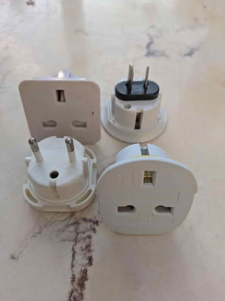 Photo of free UK plug travel adaptor x 4 (Ruislip UB10) #1
