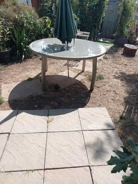 Photo of free Large glass and steel garden table (Anstey LE7) #4