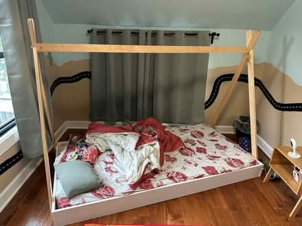 Photo of free Twin floor bed frame (Evanston (Green Bay & Emerson)) #1