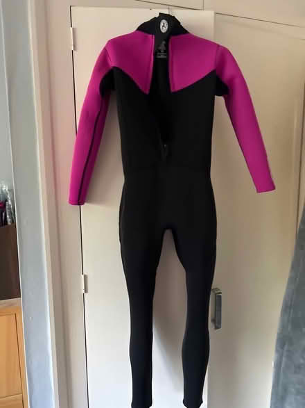 Photo of free Full length child’s wetsuit - pink & black (Little Chalfont HP8) #1