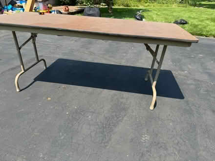 Photo of free Wooden table (Des Peres) #1