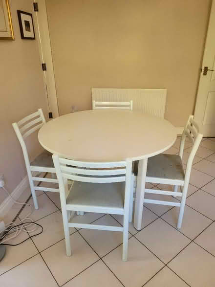 Photo of free White kitchen table and four chairs (Frith Hill GU7) #1