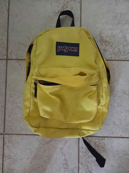 Photo of free used yellow Jansport backpack (Elmvale acres, Lynda lane park) #1
