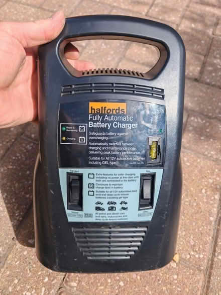 Photo of free Battery charger (Oakley RG23) #1
