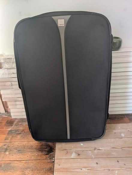 Photo of free Large Tripp suitcase (Hastings TN34) #1