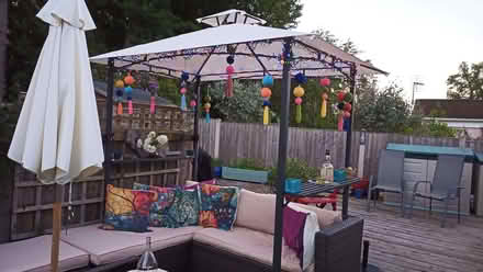 Photo of free L shaped outdoor settee and cream cushions, (Brompton SY15) #1