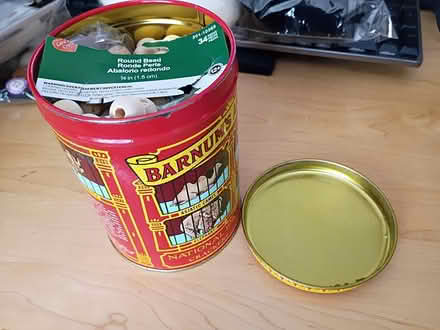 Photo of free Crackers Tin w/ wood Beads (Vacaville) #1