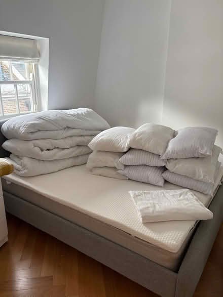 Photo of free Bedding: 2 Double duvets, 7 pillows… (Notting Hill Gate W11) #1