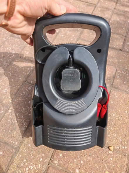 Photo of free Battery charger (Oakley RG23) #2