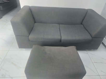 Photo of free Grey sofa and footrest (Killingbeck LS14) #1