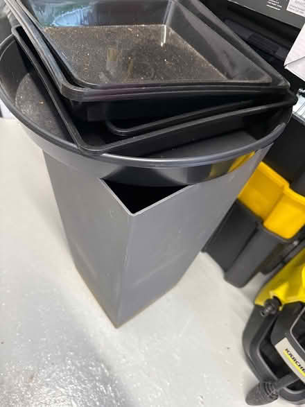 Photo of free Tall grey planter and plant trays (Faygate) #1