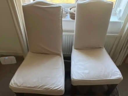 Photo of free Pair of cream upholstered dining chairs (Leintwardine SY7) #1