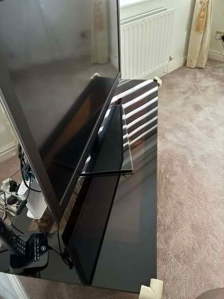 Photo of free Dark wood and glass TV unit (Wilson DE73) #4