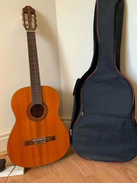 Photo of free Lorenzo acoustic guitar and gig bag. (Huby LS17) #1