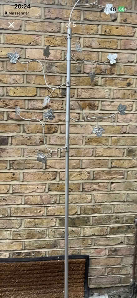 Photo of free Silver metal bird leaf feeder pole (Chiswick) #1