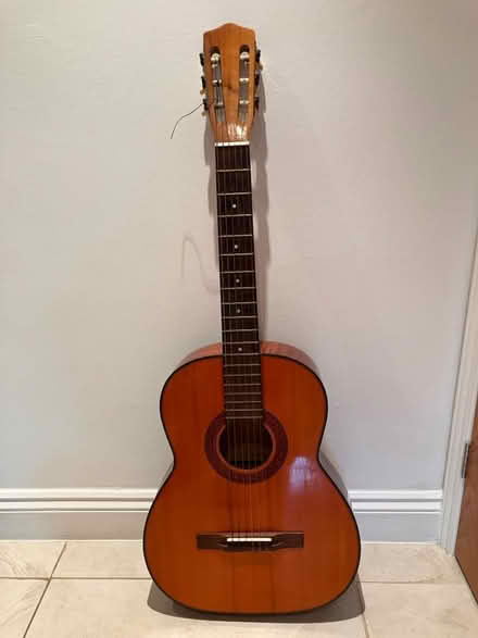 Photo of free Acoustic guitar and case (Strawberry Hill TW2) #1