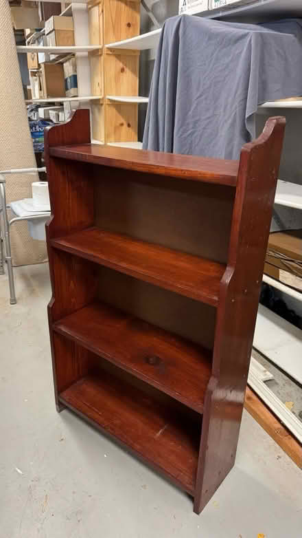 Photo of free Small wooden bookcase (Manalapan Craig Rd off Rt 9) #1