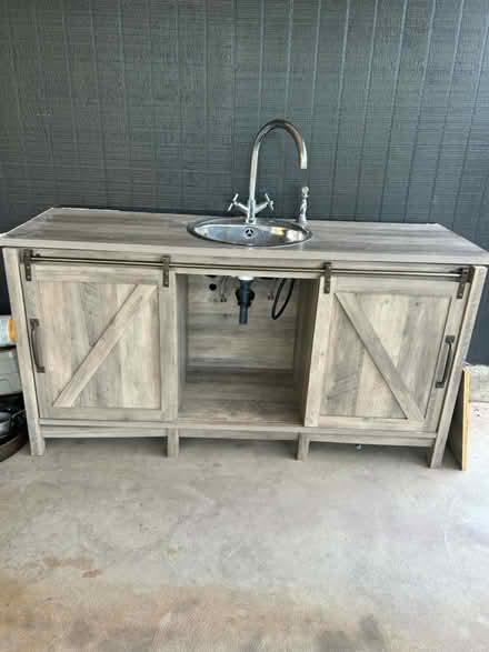 Photo of free Cabinet, sink installed (East side: Speedway & Harrison) #1