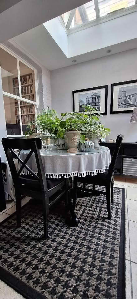 Photo of free Black round Ikea table and 4 chairs (Lion Gate TW9) #1