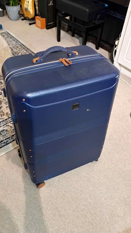 Photo of free Large Suitcase - broken wheel (Nevern Square SW5) #3