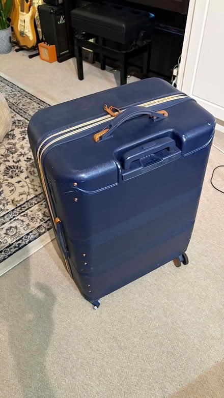 Photo of free Large Suitcase - broken wheel (Nevern Square SW5) #2