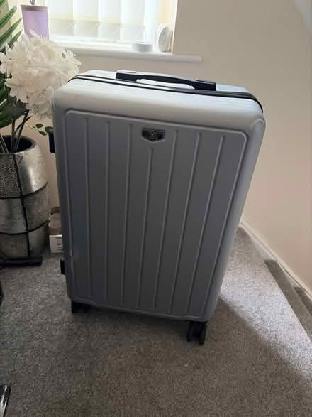 Photo of free Lightweight silver suitcase (Saltney Ferry CH4) #1