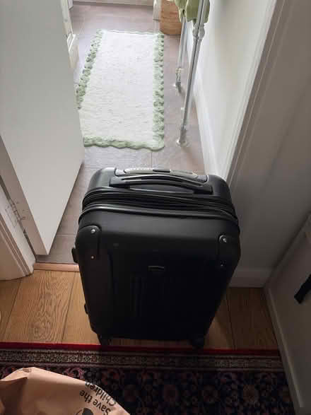 Photo of free Small black suitcase + duffel bag (NW3 2DT) #1