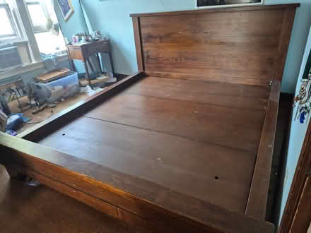 Photo of free solid wood cali king bed frame (Greenwood & 80th St) #1