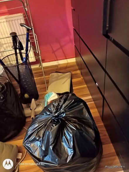 Photo of free Black bag of doggie clothes, a mixture of Christmas jumpers (Drylaw EH4) #1