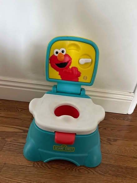 Photo of free Elmo Potty Seat and step stool (Granada Hills) #1