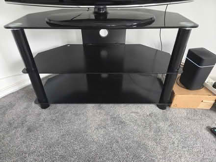 Photo of free Black glass TV stand (Staines TW18) #2